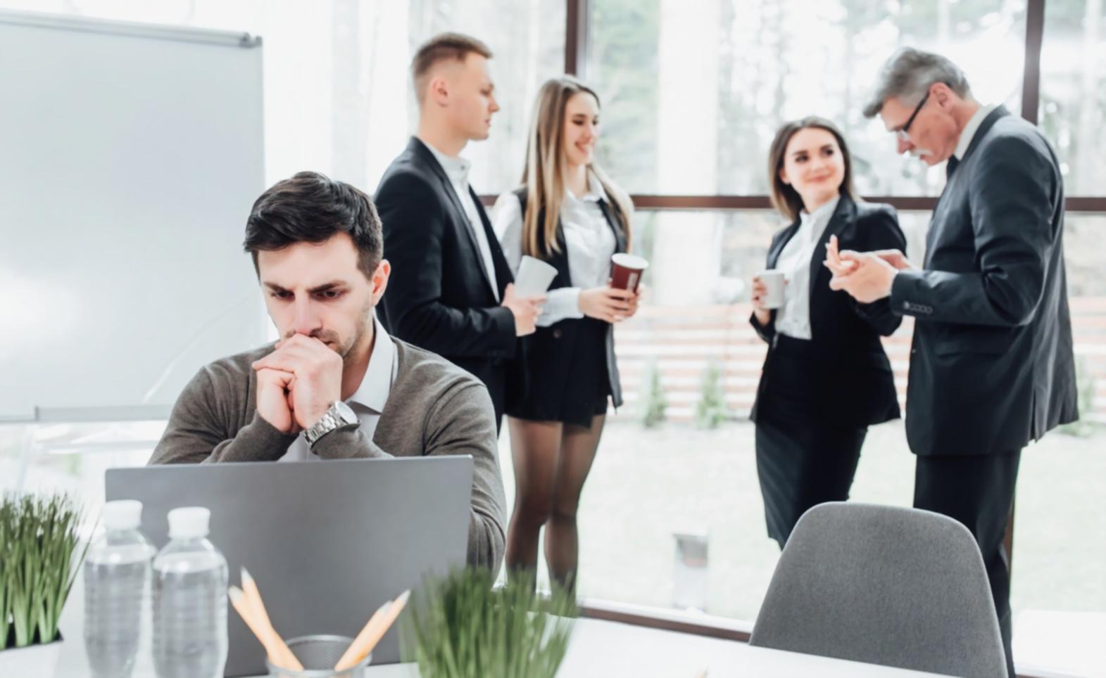 Professional reviewing financial reports and market analysis documents